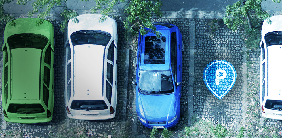 Rented parking spaces from above with the parku logo